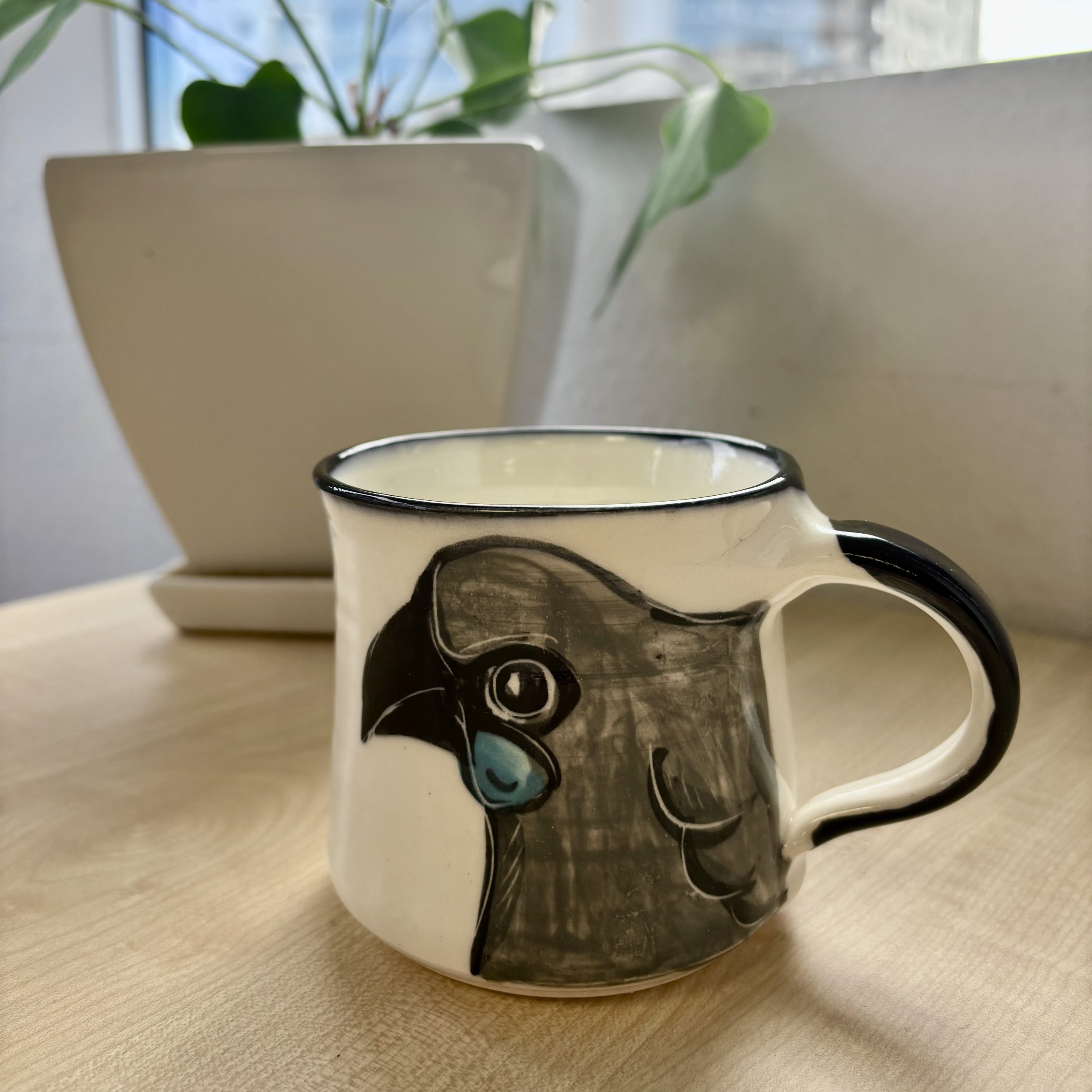 mug depicting kokako bird