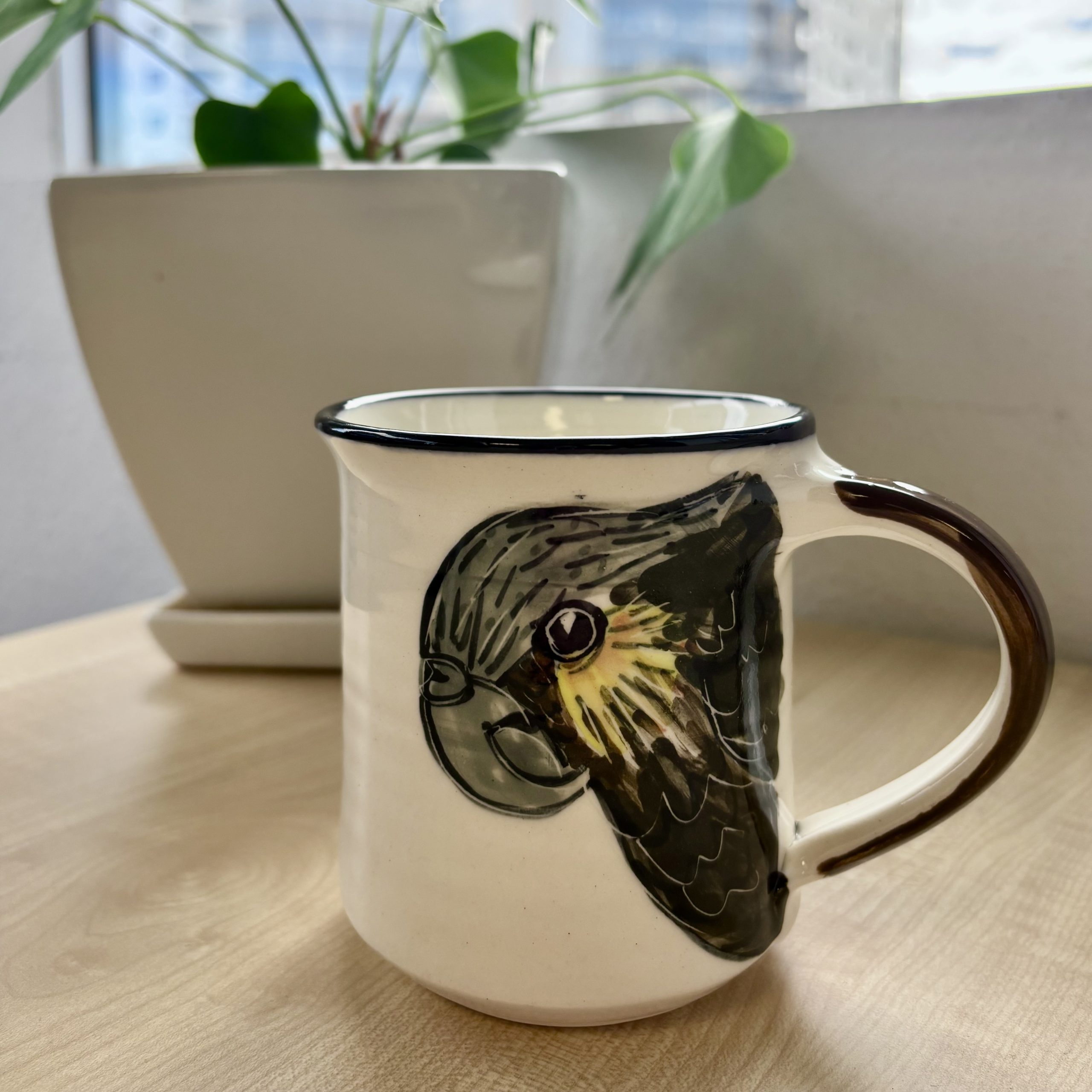 mug depicting kaka bird